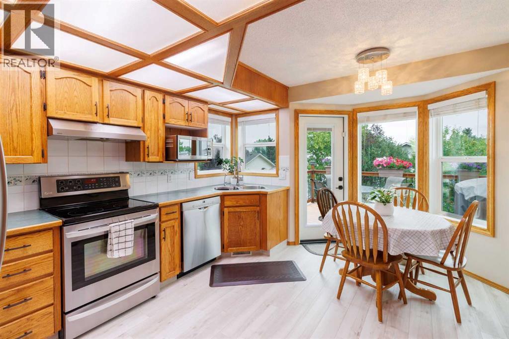 Single Family House 4 Level for Sale in  Macewan Ridge Gate NW MacEwan Glen Calgary 