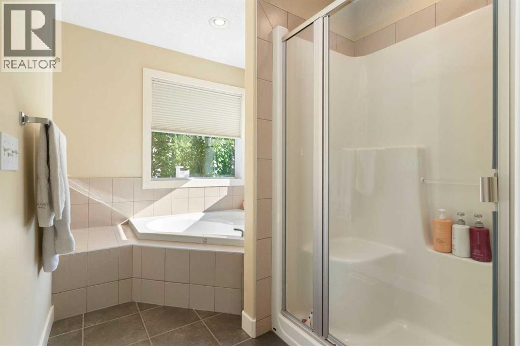 Single Family House for Sale in  Tuscany Glen Way NW Tuscany Calgary 