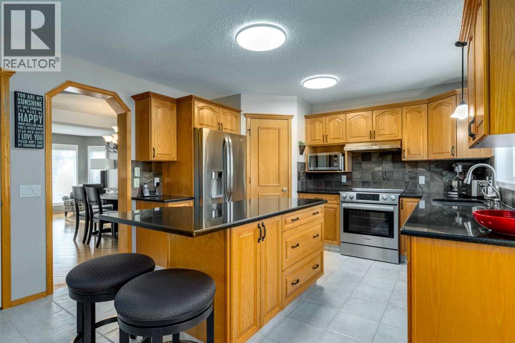 Single Family House for Sale in  Sierra Madre Court SW Signal Hill Calgary 