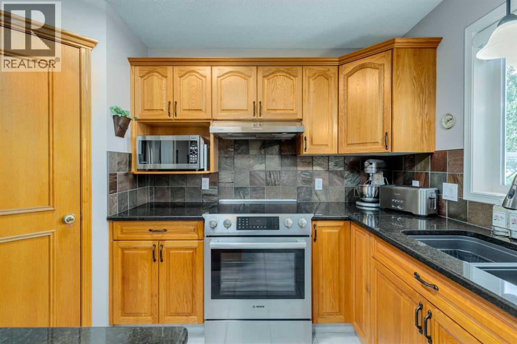 Single Family House for Sale in  Sierra Madre Court SW Signal Hill Calgary 