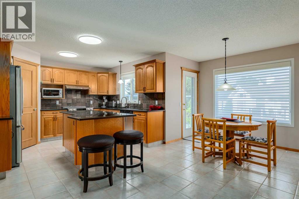 Single Family House for Sale in  Sierra Madre Court SW Signal Hill Calgary 