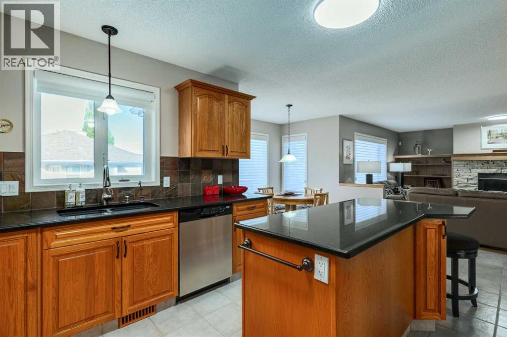 Single Family House for Sale in  Sierra Madre Court SW Signal Hill Calgary 