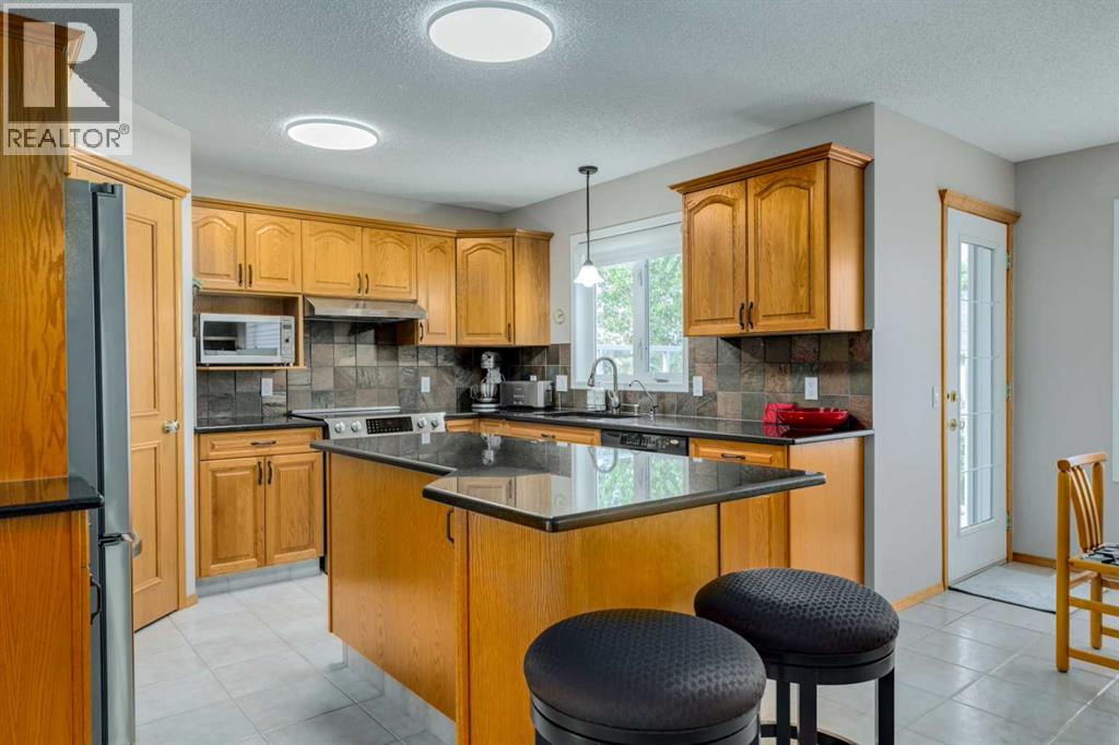 Single Family House for Sale in  Sierra Madre Court SW Signal Hill Calgary 