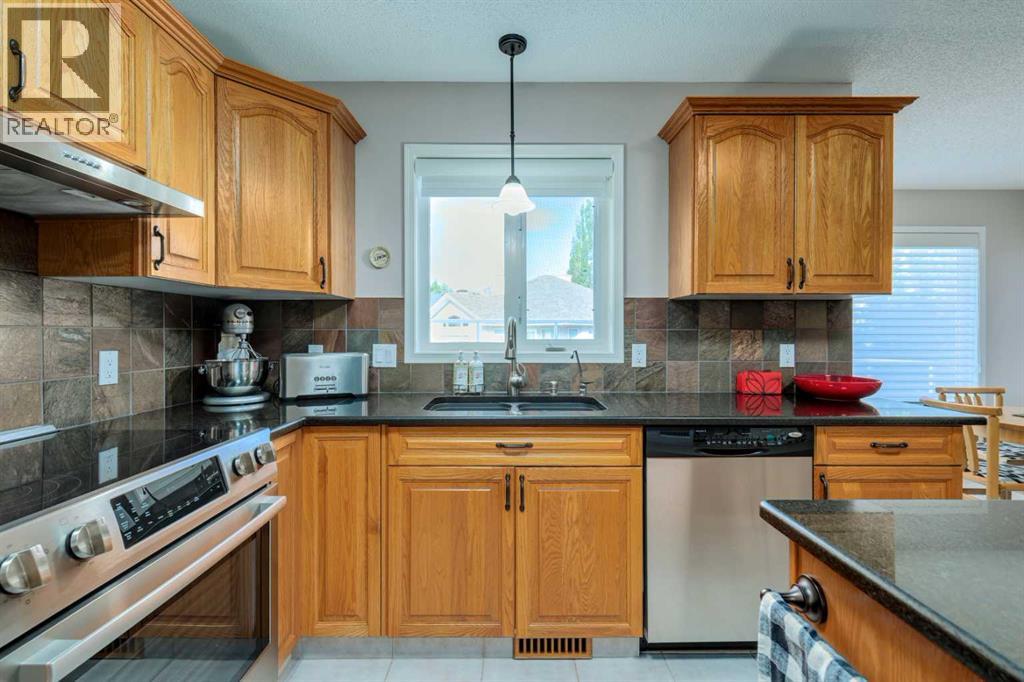 Single Family House for Sale in  Sierra Madre Court SW Signal Hill Calgary 