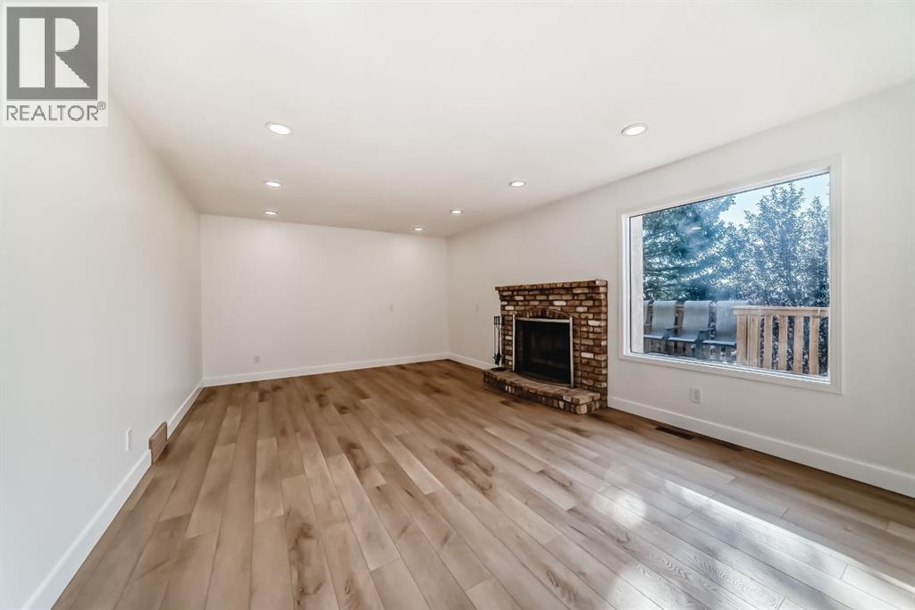 Single Family House for Sale in  Signature Close SW Signal Hill Calgary 