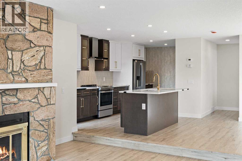 Single Family House 4 Level for Sale in   Prominence Way SW Patterson Calgary 