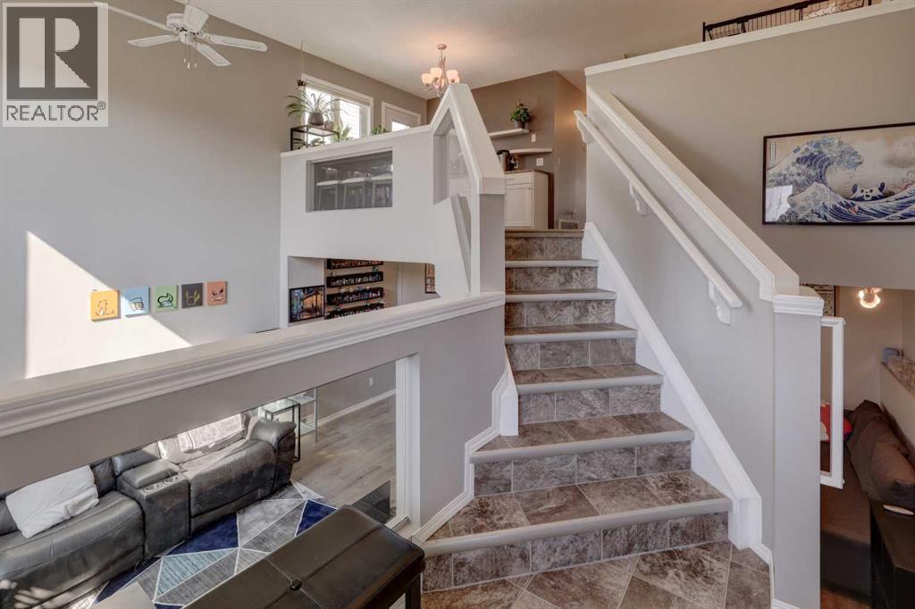 Single Family House Bi-level for Sale in  Arbour Grove Close NW Arbour Lake Calgary 