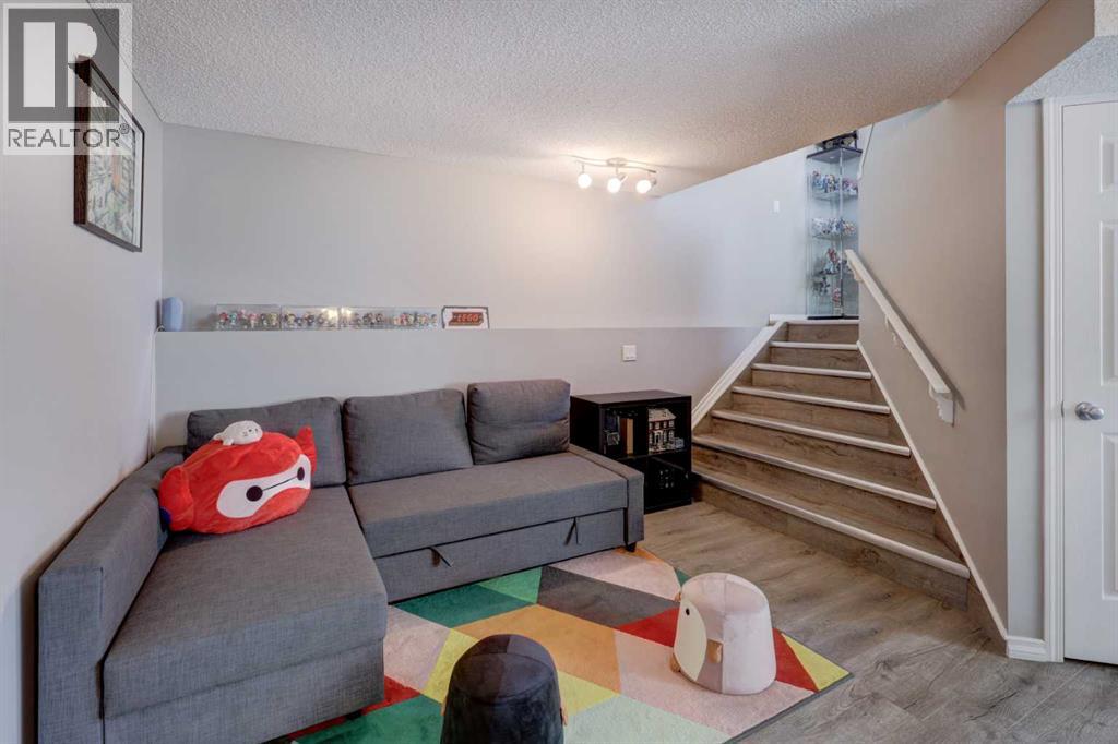 Single Family House Bi-level for Sale in  Arbour Grove Close NW Arbour Lake Calgary 