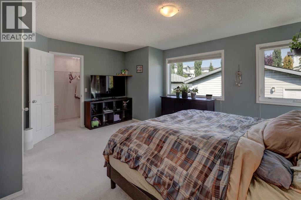 Single Family House Bi-level for Sale in  Arbour Grove Close NW Arbour Lake Calgary 