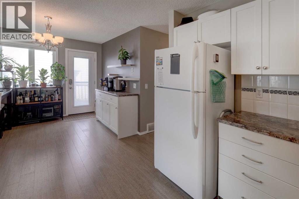Single Family House Bi-level for Sale in  Arbour Grove Close NW Arbour Lake Calgary 