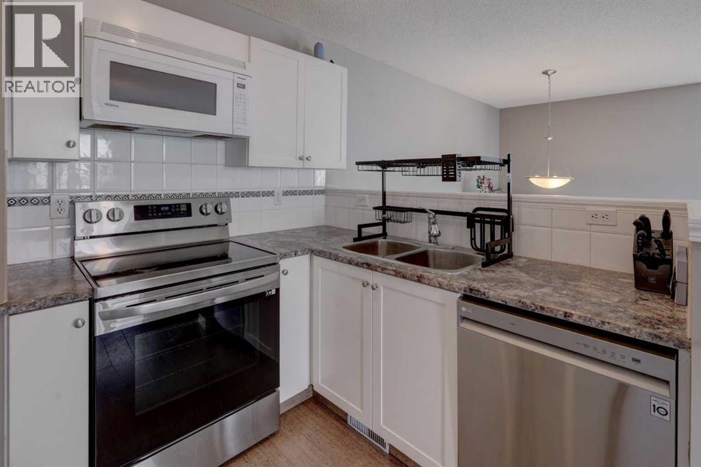 Single Family House Bi-level for Sale in  Arbour Grove Close NW Arbour Lake Calgary 