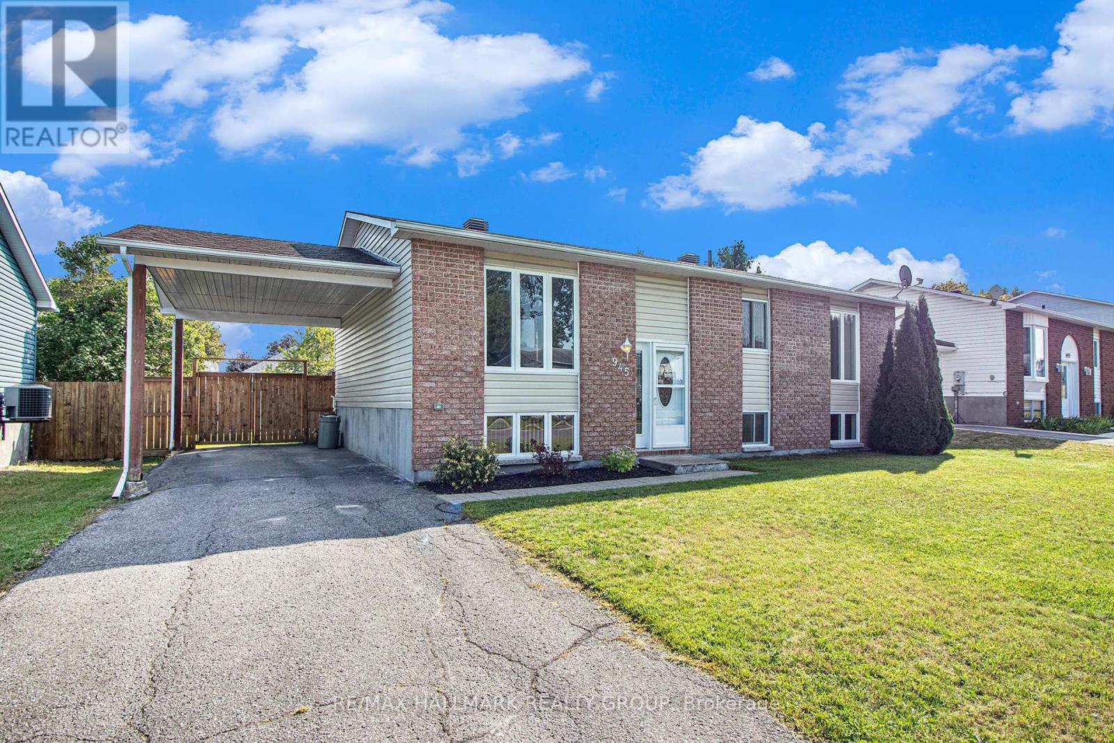 Convenient carport with double gate to yard.