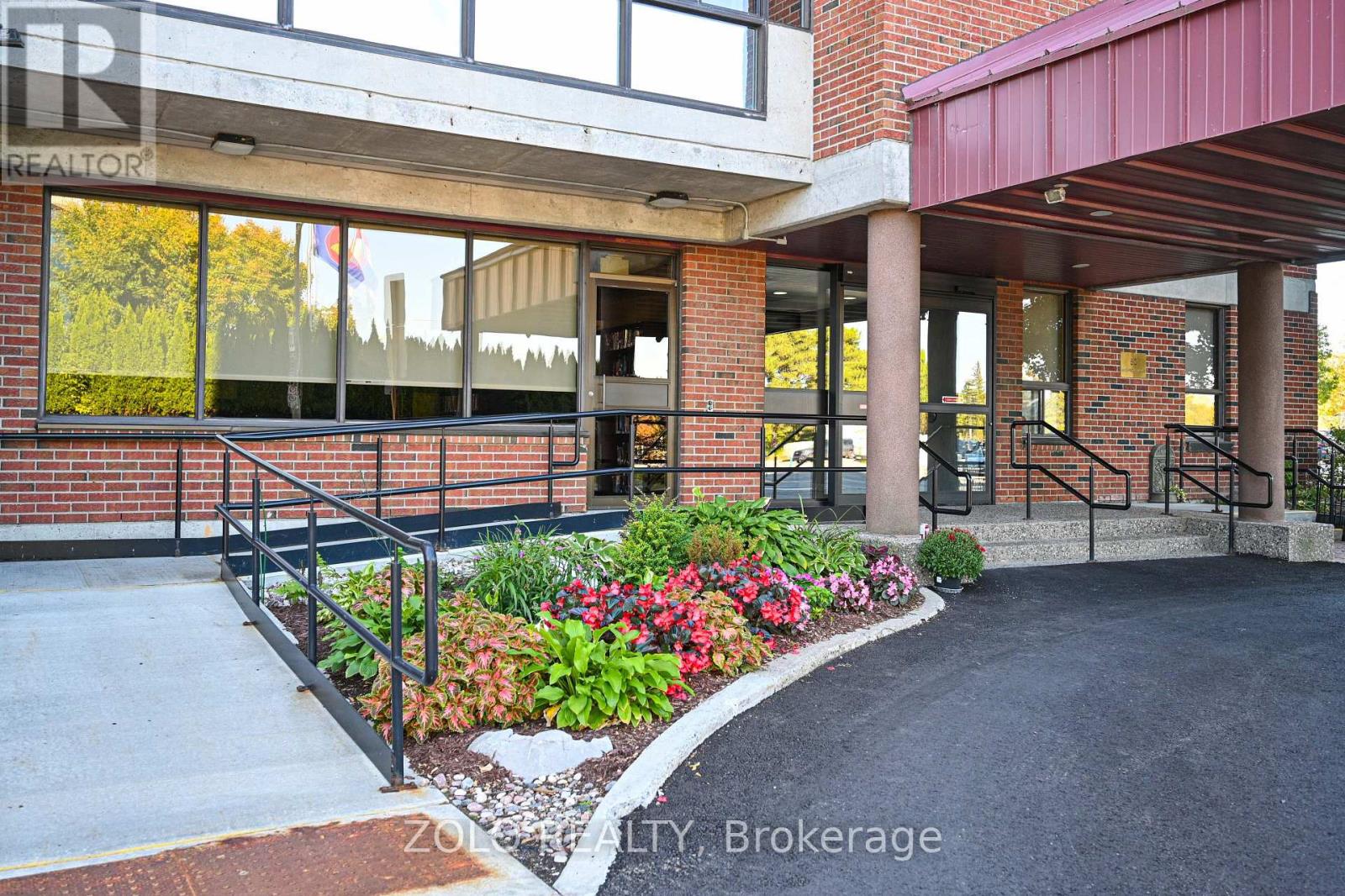 Front entrance with wheel chair ramp.