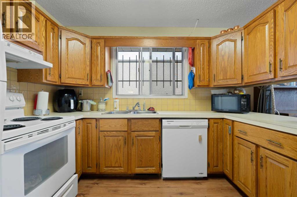 Single Family House Bi-level for Sale in   Street SE Forest Lawn Calgary 