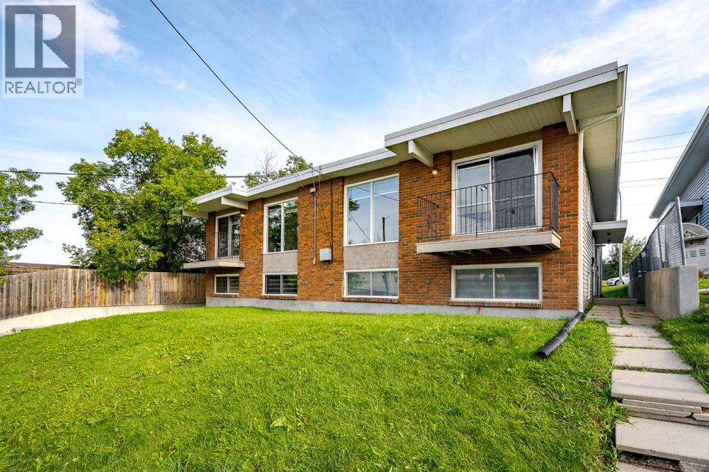 Multi-family House Bi-level for Sale in  Sabrina Road SW Southwood Calgary 