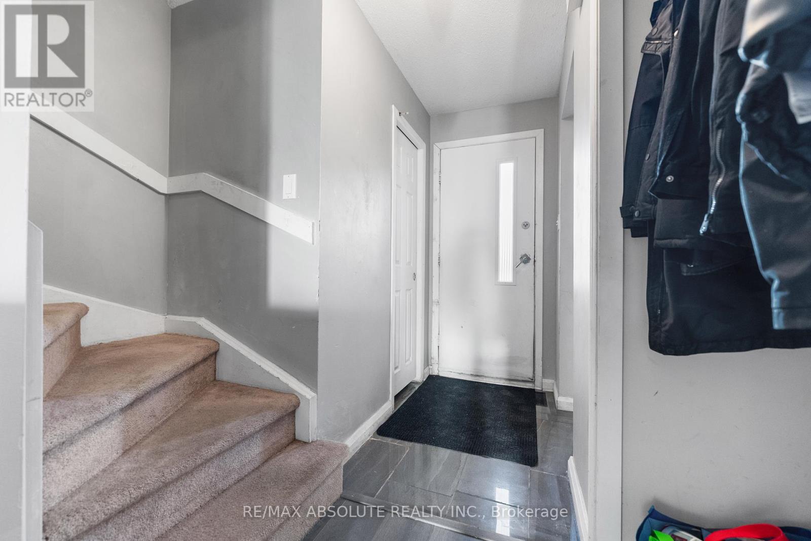 Front door with powder room just on left side