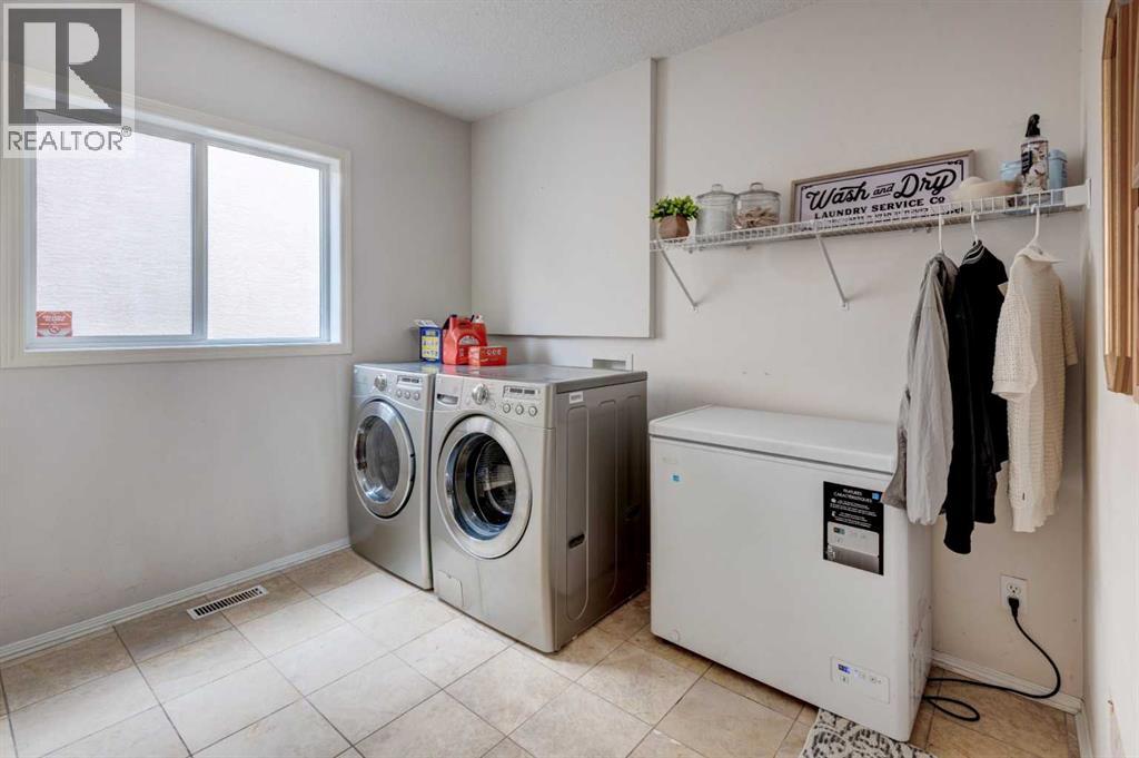 Single Family House Bi-level for Sale in  Mt Douglas Circle SE McKenzie Lake Calgary 