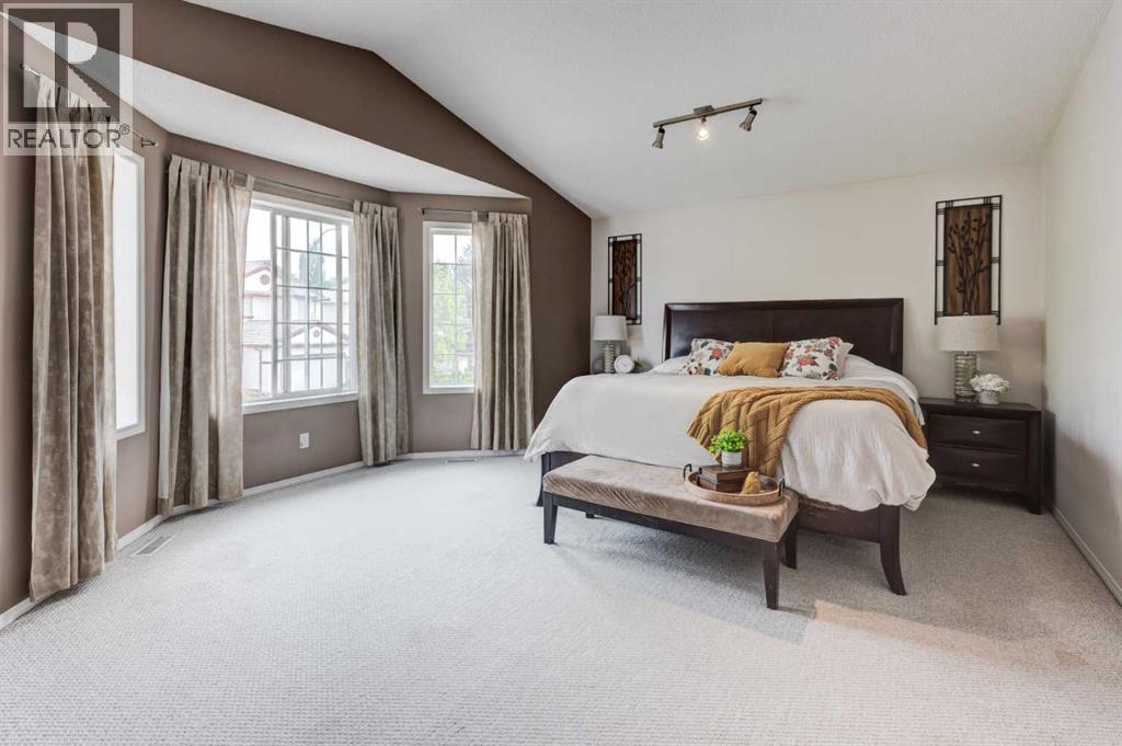 Single Family House Bi-level for Sale in  Mt Douglas Circle SE McKenzie Lake Calgary 