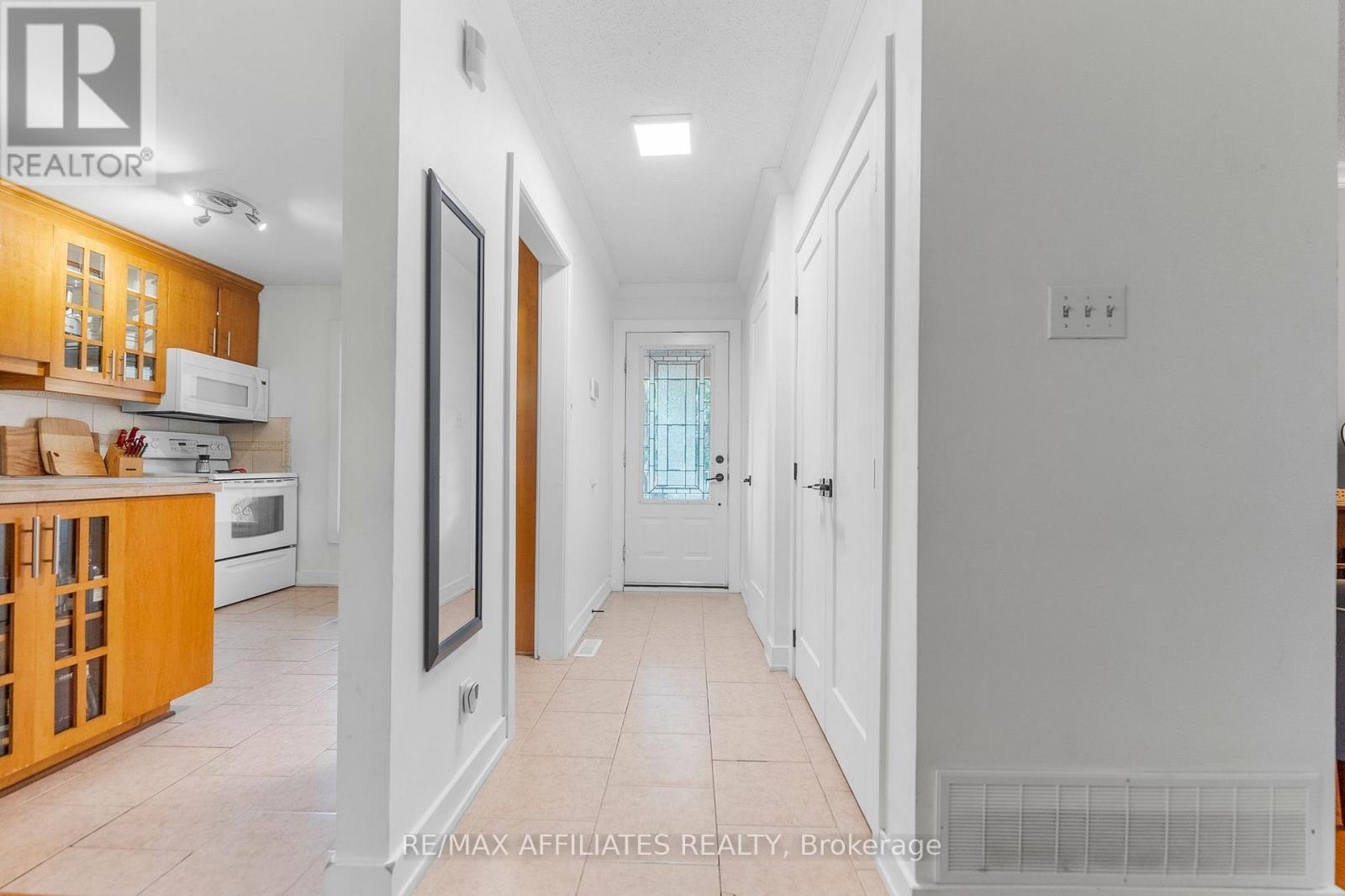 Bright cheery entrance - checkout the sleek doors!