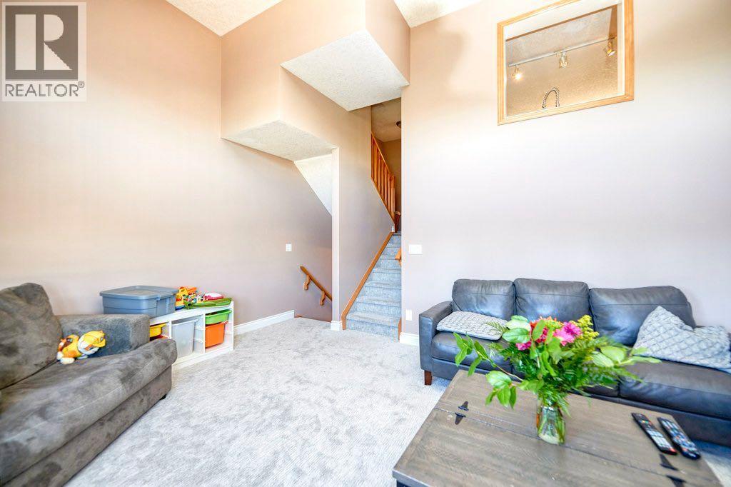 Single Family House 4 Level for Sale in  Cougar Ridge Mews SW Cougar Ridge Calgary 
