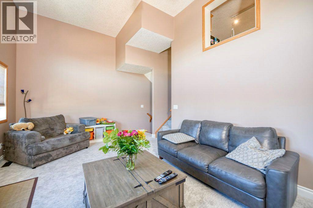 Single Family House 4 Level for Sale in  Cougar Ridge Mews SW Cougar Ridge Calgary 