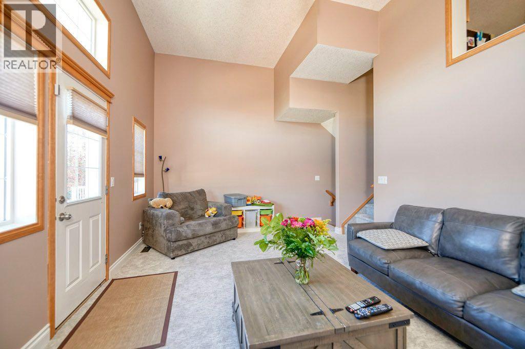Single Family House 4 Level for Sale in  Cougar Ridge Mews SW Cougar Ridge Calgary 