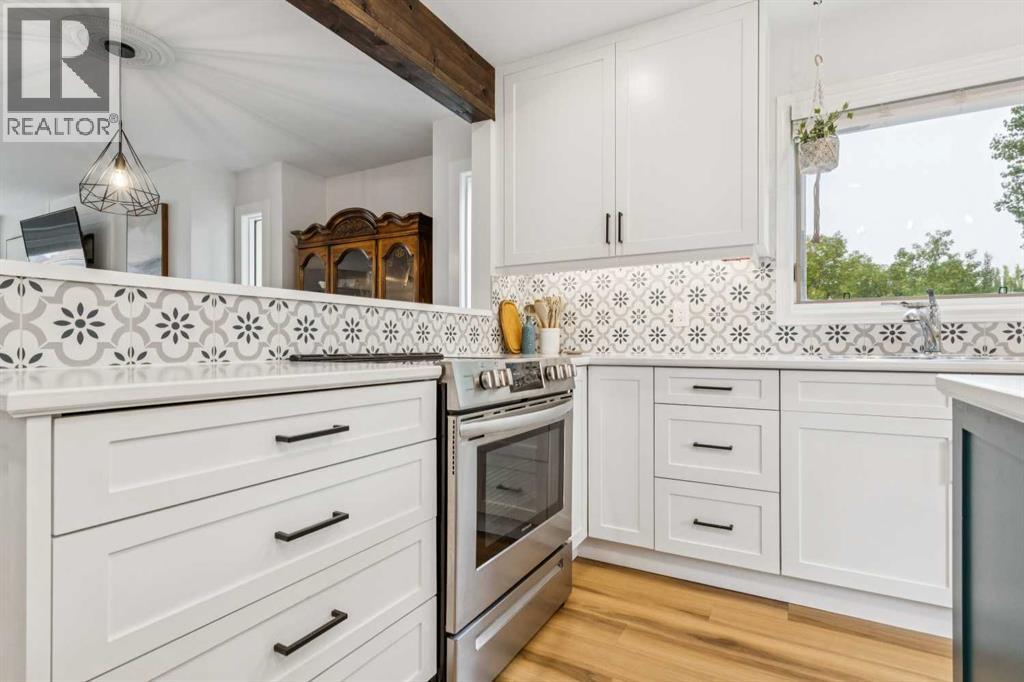 Single Family House Bungalow for Sale in  Macewan Ridge Place NW MacEwan Glen Calgary 