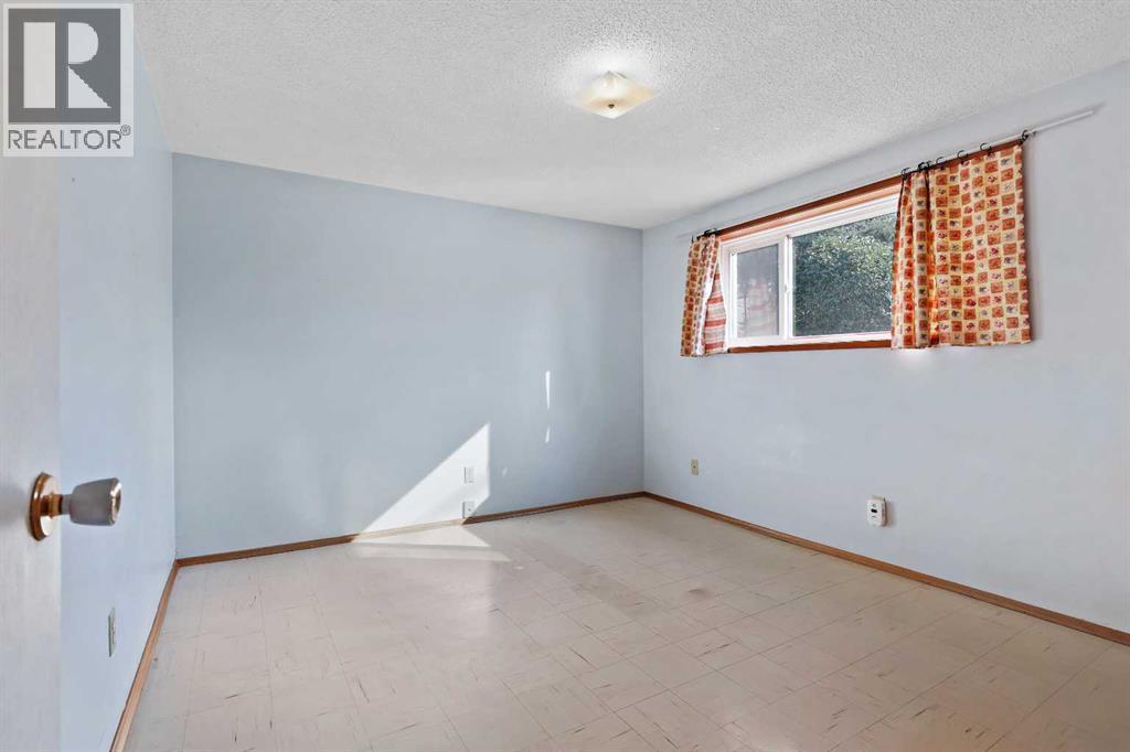Multi-family House Bungalow for Sale in   Street SW Rutland Park Calgary 