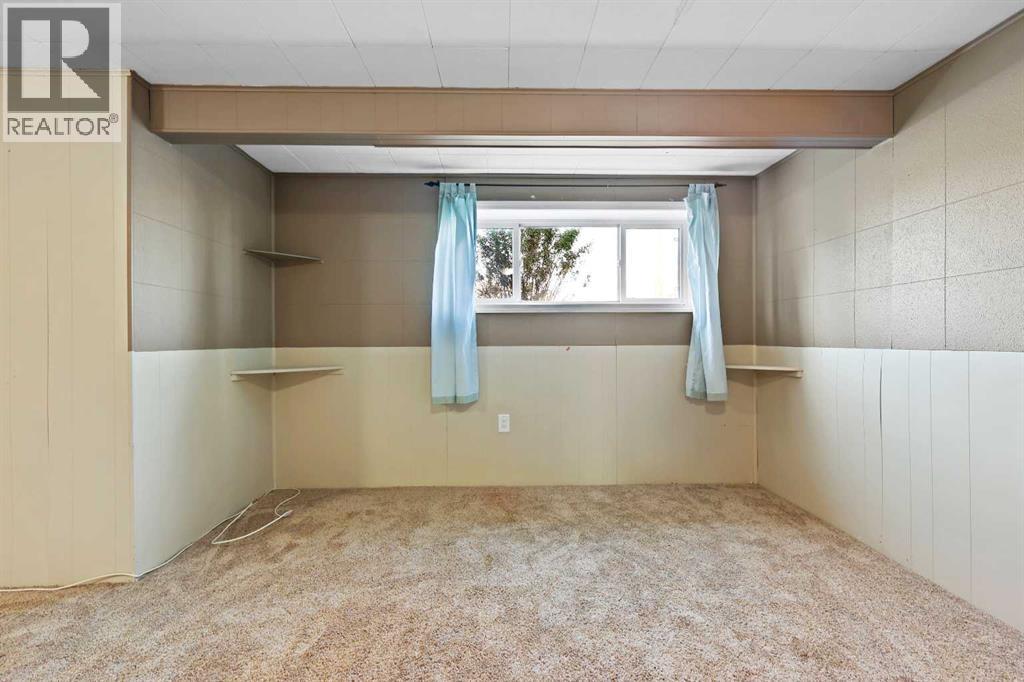 Multi-family House Bungalow for Sale in   Street SW Rutland Park Calgary 