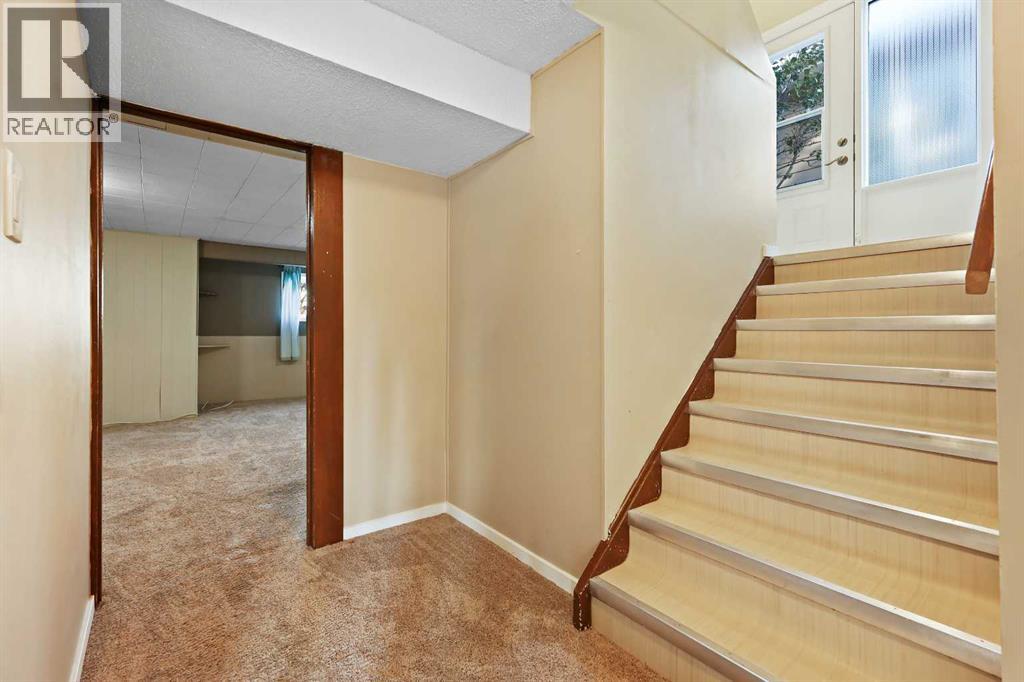 Multi-family House Bungalow for Sale in   Street SW Rutland Park Calgary 