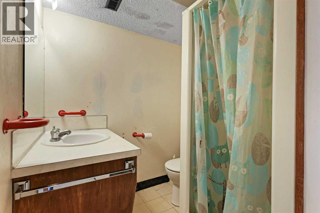 Multi-family House Bungalow for Sale in   Street SW Rutland Park Calgary 