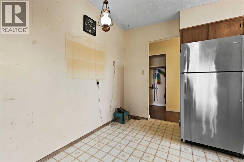 Multi-family House Bungalow for Sale in   Street SW Rutland Park Calgary 