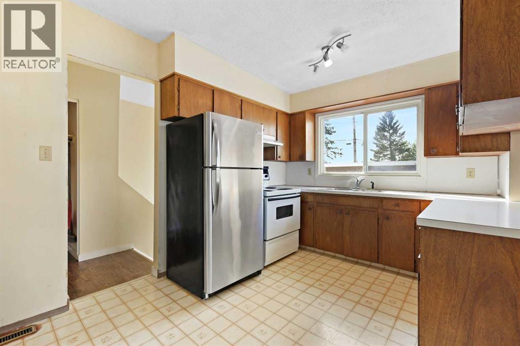 Multi-family House Bungalow for Sale in   Street SW Rutland Park Calgary 