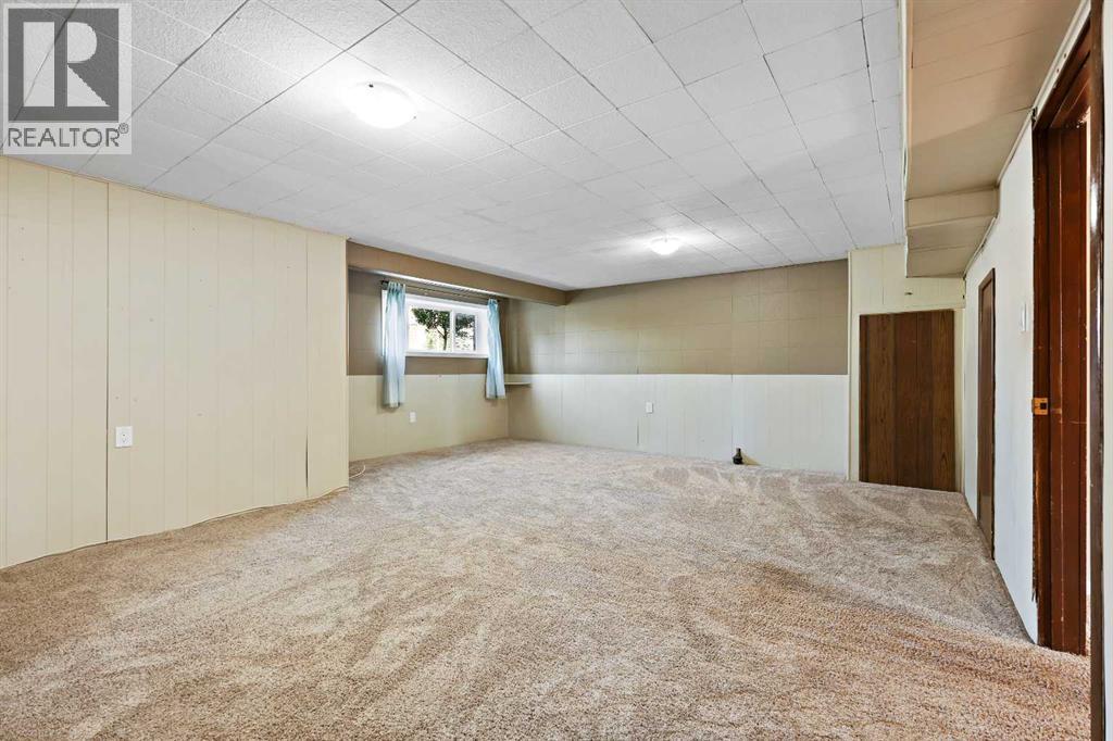 Multi-family House Bungalow for Sale in   Street SW Rutland Park Calgary 