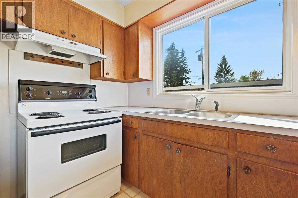 Multi-family House Bungalow for Sale in   Street SW Rutland Park Calgary 