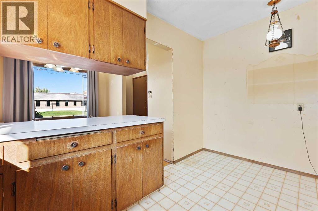 Multi-family House Bungalow for Sale in   Street SW Rutland Park Calgary 