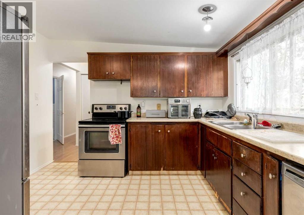 Multi-family House Bungalow for Sale in  Allandale Close SE Acadia Calgary 