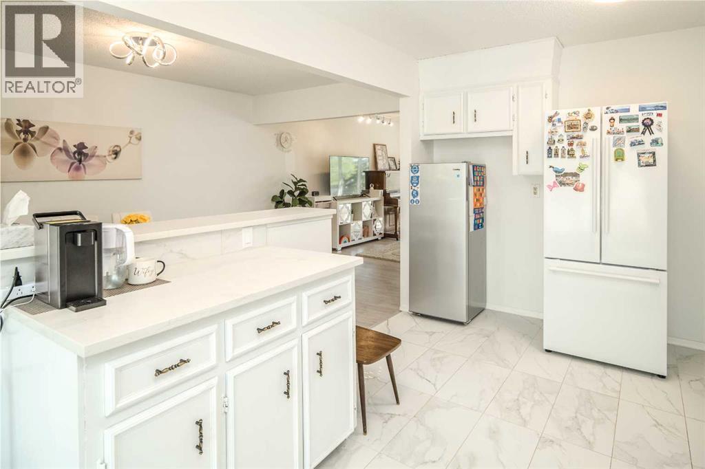Single Family House Bi-level for Sale in  Edenwold Drive NW Edgemont Calgary 