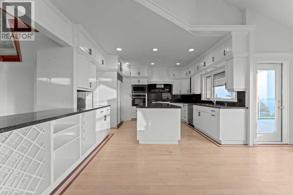 Single Family House Bungalow for Sale in  Slopes Grove SW Springbank Hill Calgary 