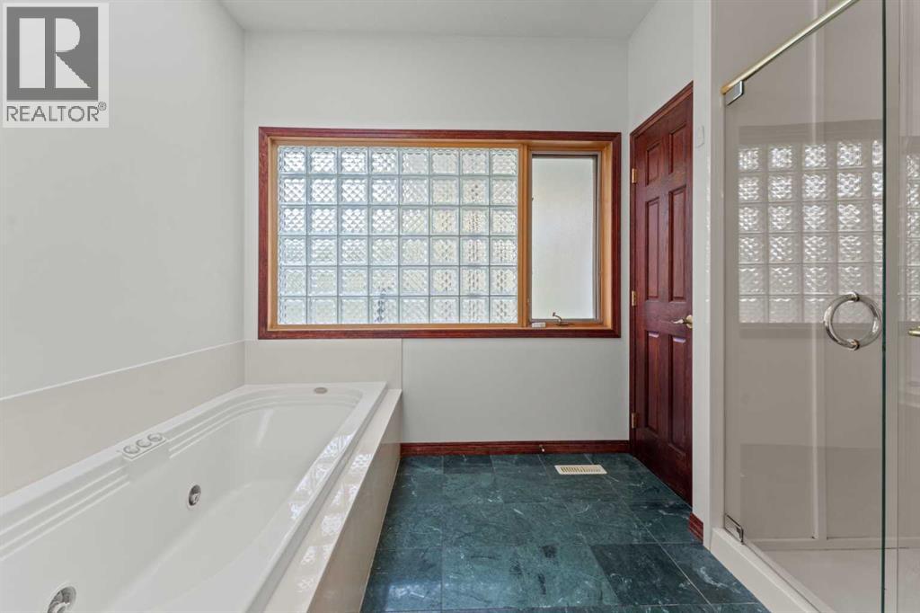 Single Family House Bungalow for Sale in  Slopes Grove SW Springbank Hill Calgary 