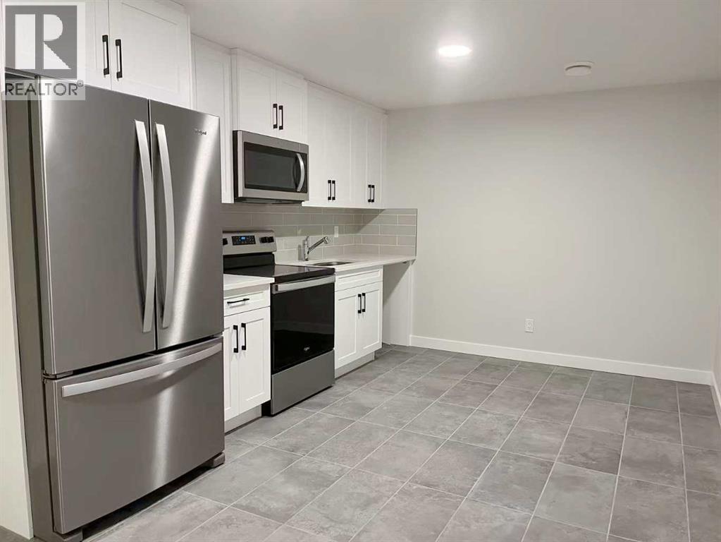 Single Family House for Sale in  Treeline Manor SW Alpine Park Calgary 