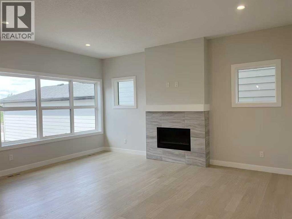 Single Family House for Sale in  Treeline Manor SW Alpine Park Calgary 