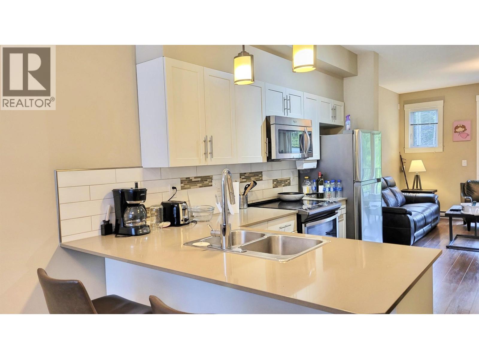 #205 110 BAXTER AVENUE - 4