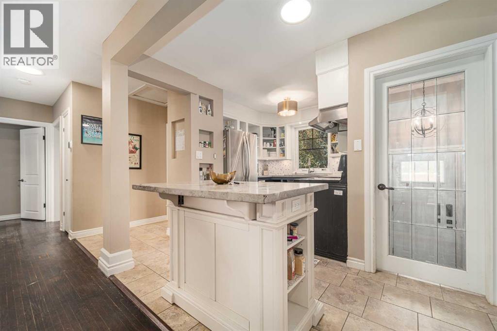 Single Family House Bungalow for Sale in  b Avenue S Victoria Park Lethbridge 