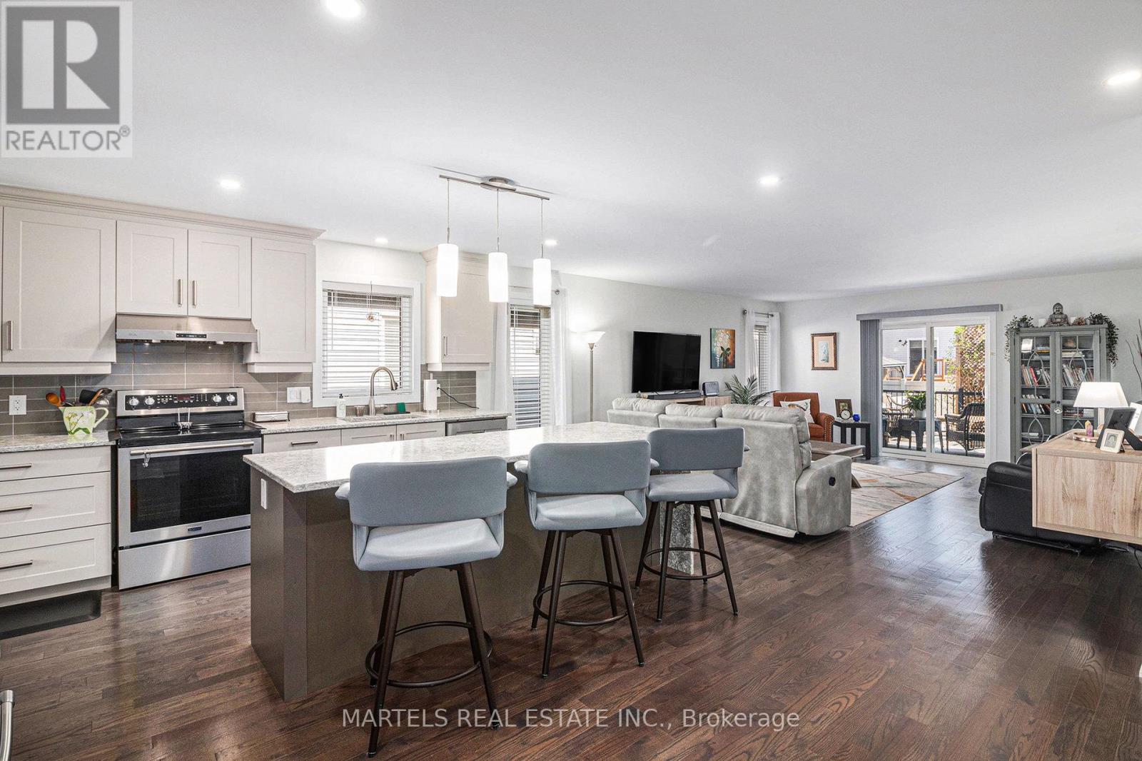 Gourmet kitchen w/high end appl's, stone & more