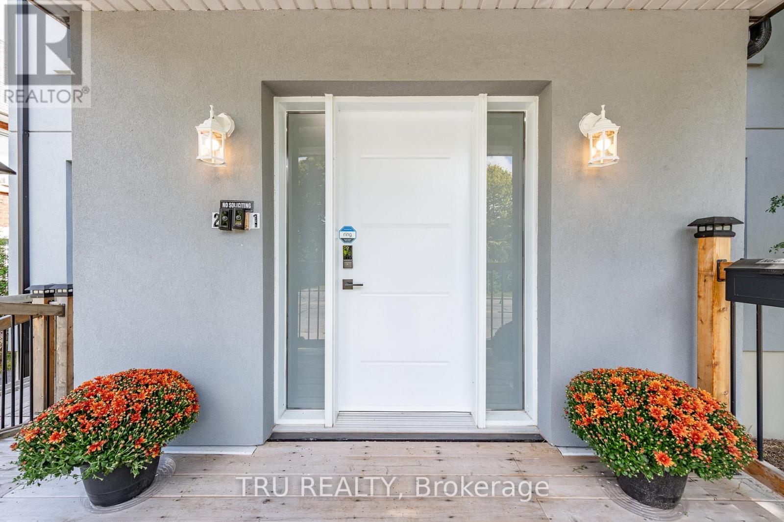 Lovely front  door with 2 ring doorbells.