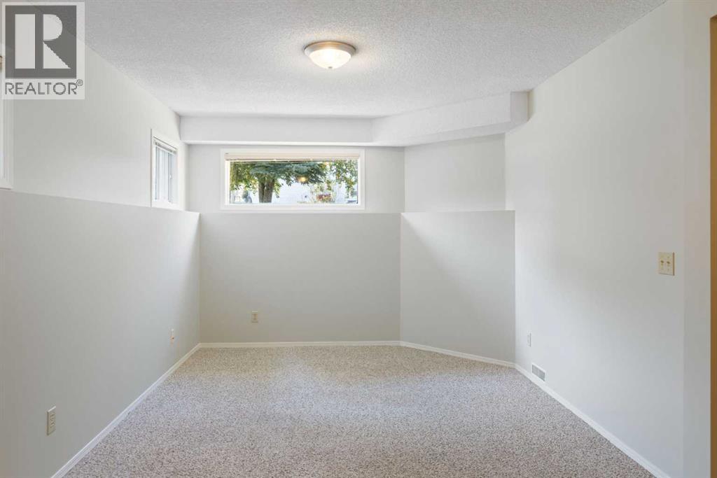 Single Family House Bi-level for Sale in  Millrise Close SW Millrise Calgary 