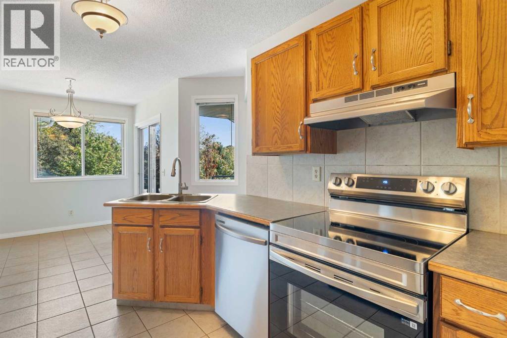 Single Family House Bi-level for Sale in  Millrise Close SW Millrise Calgary 