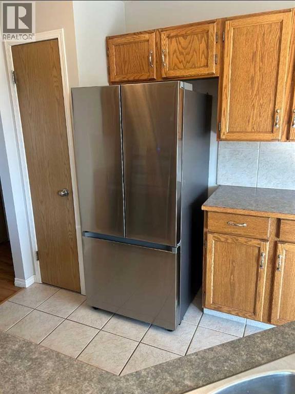 Single Family House Bi-level for Sale in  Millrise Close SW Millrise Calgary 