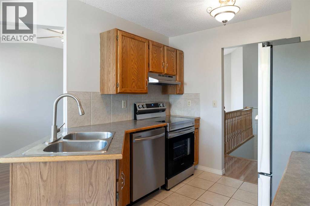 Single Family House Bi-level for Sale in  Millrise Close SW Millrise Calgary 